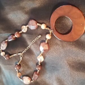 Crystal cut resin pendant necklace.